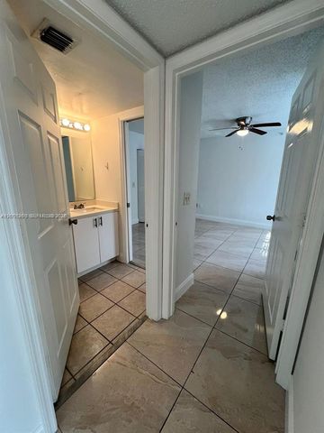 5065 Wiles Road 103, Coconut Creek, FL 33073