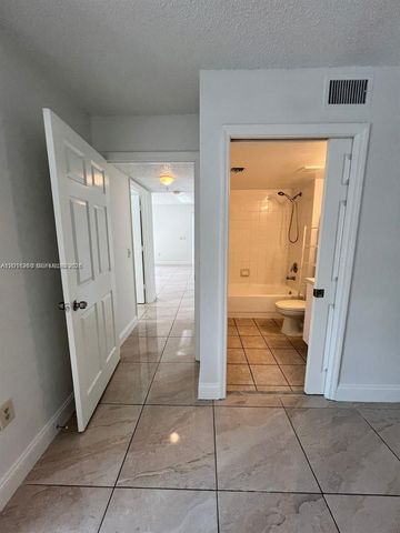 5065 Wiles Road 103, Coconut Creek, FL 33073