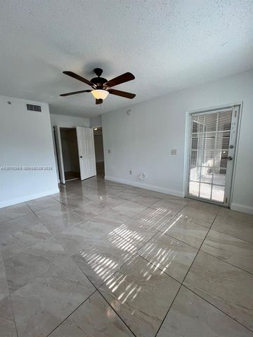 5065 Wiles Road 103, Coconut Creek, FL 33073