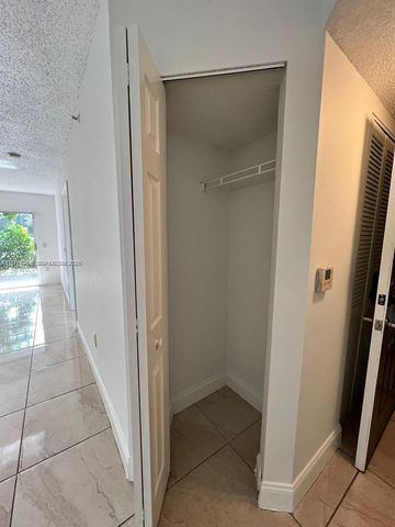 5065 Wiles Road 103, Coconut Creek, FL 33073