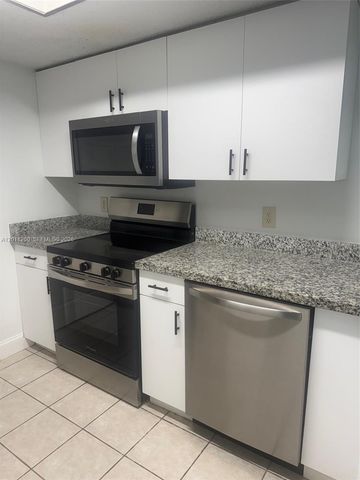 5065 Wiles Road 103, Coconut Creek, FL 33073