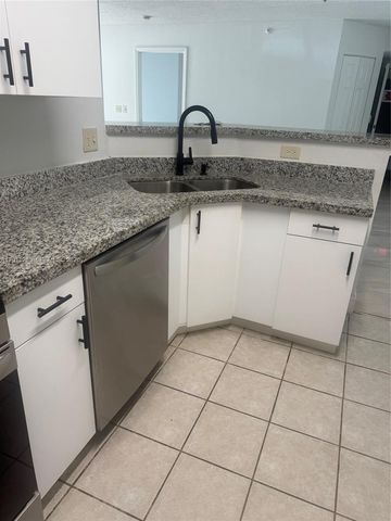 5065 Wiles Road 103, Coconut Creek, FL 33073