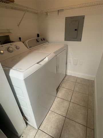 5065 Wiles Road 103, Coconut Creek, FL 33073