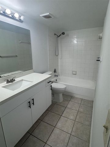 5065 Wiles Road 103, Coconut Creek, FL 33073