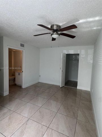 5065 Wiles Road 103, Coconut Creek, FL 33073