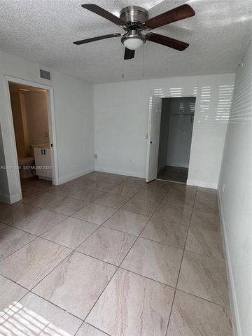 5065 Wiles Road 103, Coconut Creek, FL 33073