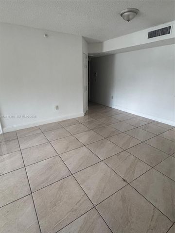 5065 Wiles Road 103, Coconut Creek, FL 33073
