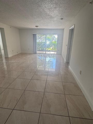 5065 Wiles Road 103, Coconut Creek, FL 33073