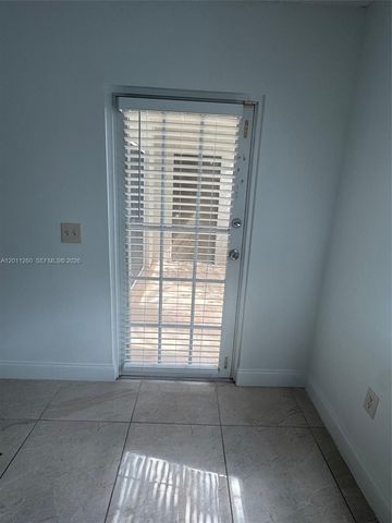5065 Wiles Road 103, Coconut Creek, FL 33073