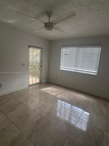5065 Wiles Road 103, Coconut Creek, FL 33073