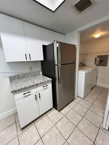 5065 Wiles Road 103, Coconut Creek, FL 33073