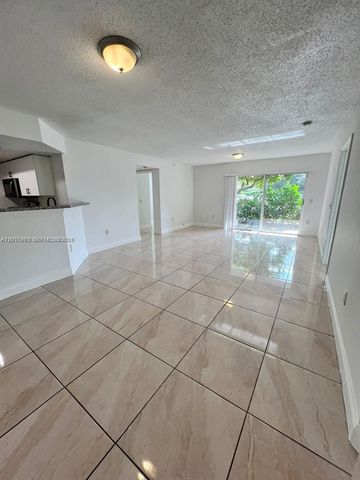 5065 Wiles Road 103, Coconut Creek, FL 33073