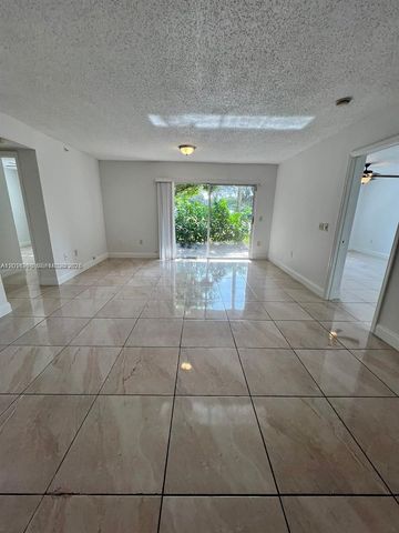 5065 Wiles Road 103, Coconut Creek, FL 33073