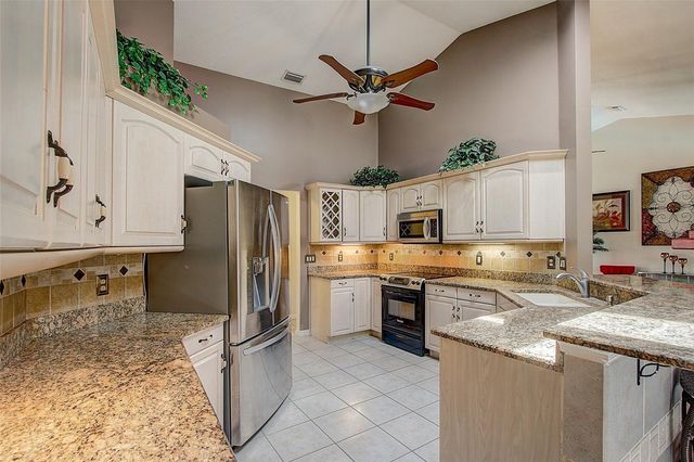 12202 RAMBLING OAK BOULEVARD, Orlando, FL 32832