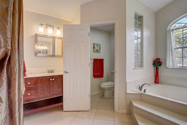 12202 RAMBLING OAK BOULEVARD, Orlando, FL 32832