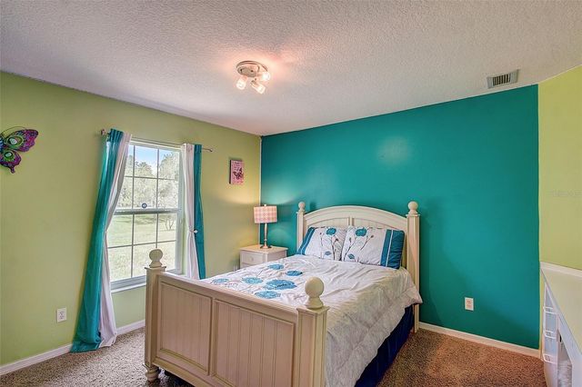 12202 RAMBLING OAK BOULEVARD, Orlando, FL 32832