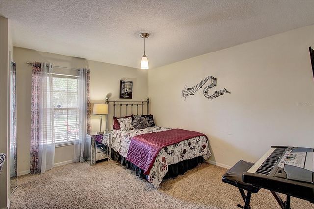 12202 RAMBLING OAK BOULEVARD, Orlando, FL 32832