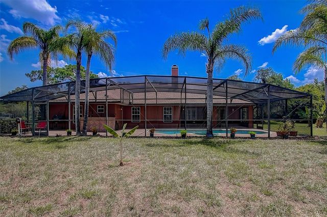 12202 RAMBLING OAK BOULEVARD, Orlando, FL 32832