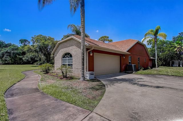 12202 RAMBLING OAK BOULEVARD, Orlando, FL 32832