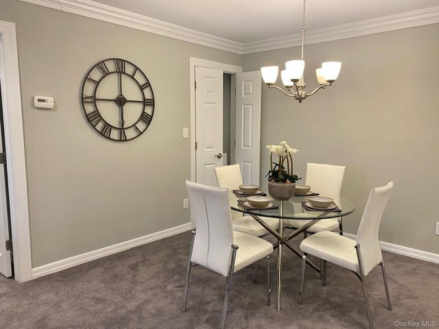 30 Westwood Drive 60, Westbury, NY 11590