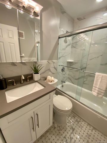 30 Westwood Drive 60, Westbury, NY 11590