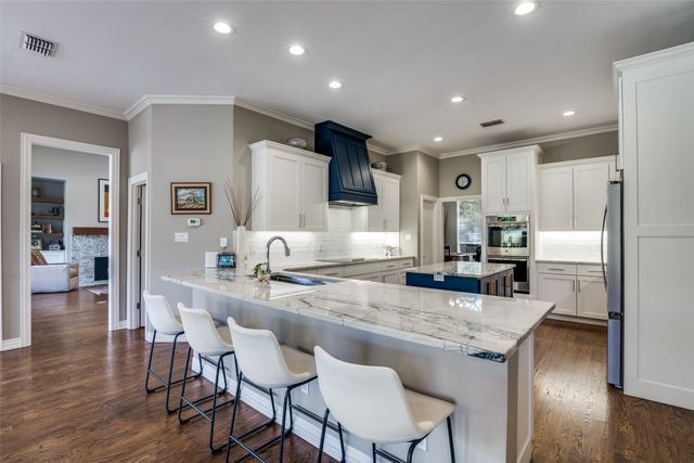 202 Carriage Hill Lane, Heath, TX 75032