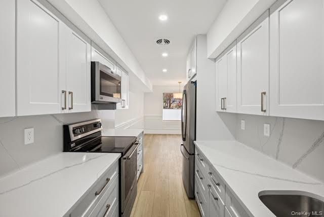 25 Alhambra Drive, Oceanside, NY 11572