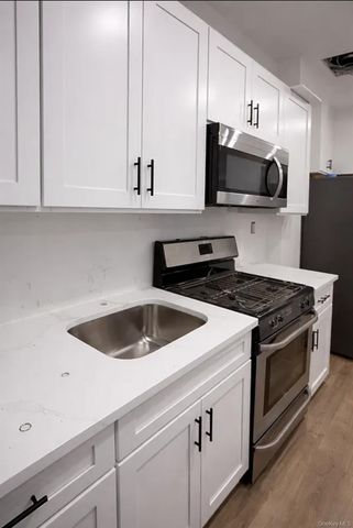 98-07 37th Avenue, Corona, NY 11368