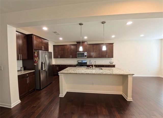 87 Round Pond Drive, Lilburn, GA 30047