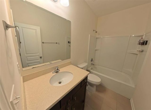 87 Round Pond Drive, Lilburn, GA 30047