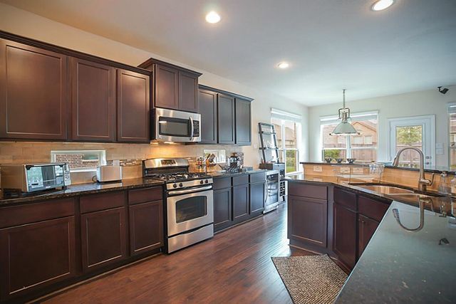 63 W Deer River Circle, The Woodlands, TX 77389