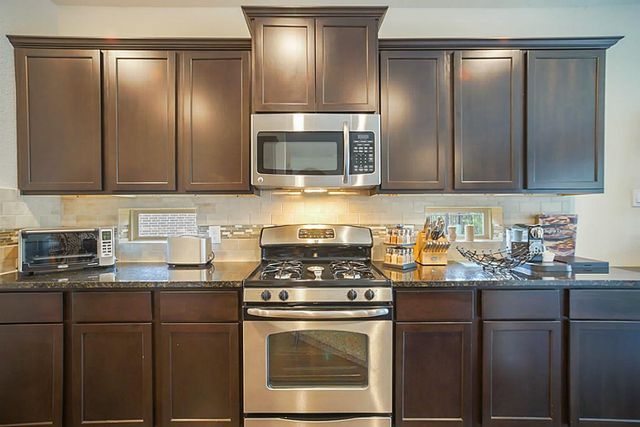 63 W Deer River Circle, The Woodlands, TX 77389