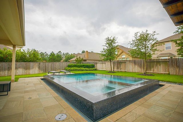 63 W Deer River Circle, The Woodlands, TX 77389