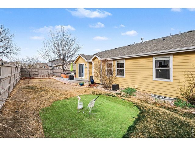 8781 Flaming Arrow Ave, Wellington, CO 80549