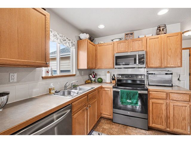 8781 Flaming Arrow Ave, Wellington, CO 80549