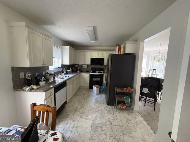 1667 Rolling Stone Drive, Lithonia, GA 30058
