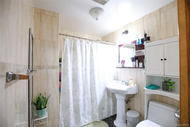 37-31 103rd Street, Corona, NY 11368