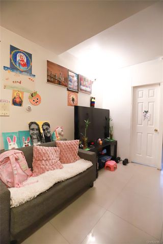 37-31 103rd Street, Corona, NY 11368