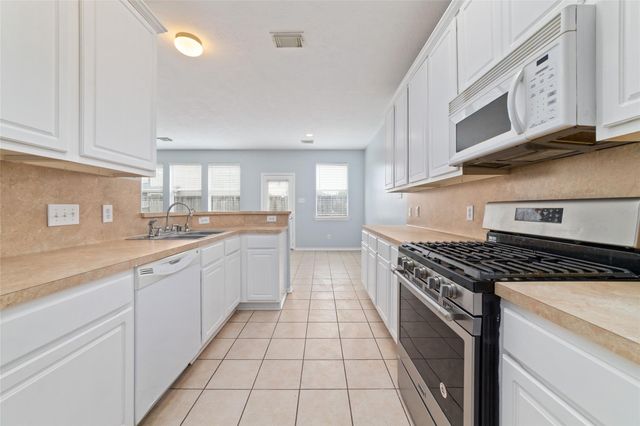 8734 Rainglen Lane, Houston, TX 77044