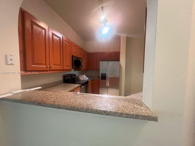 3500 Oaks Clubhouse Drive 207, Pompano Beach, FL 33069