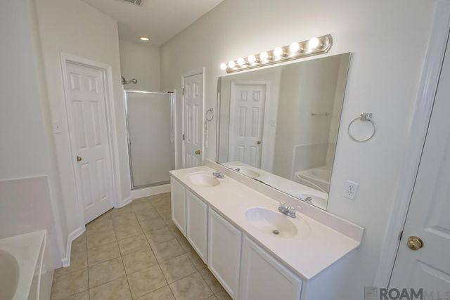 5345 Faulkner Dr, Darrow, LA 70725