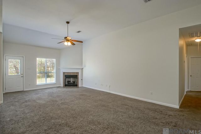 5345 Faulkner Dr, Darrow, LA 70725