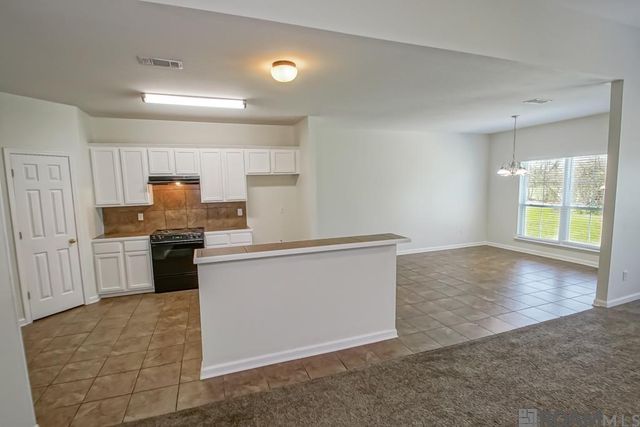 5345 Faulkner Dr, Darrow, LA 70725