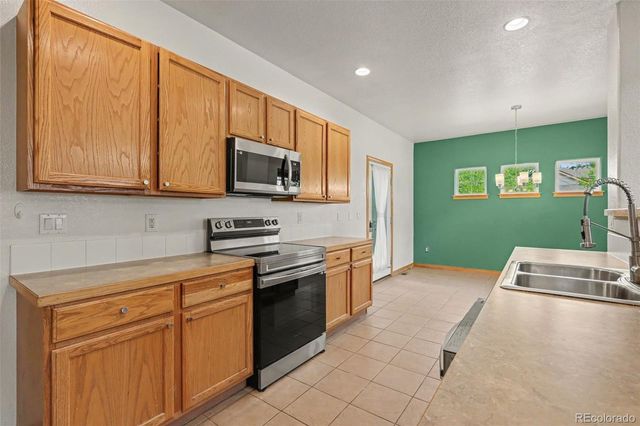 489 Longspur Drive, Brighton, CO 80601