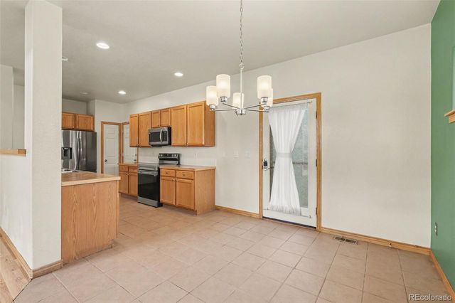489 Longspur Drive, Brighton, CO 80601