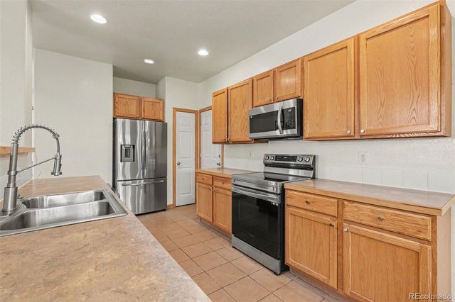 489 Longspur Drive, Brighton, CO 80601