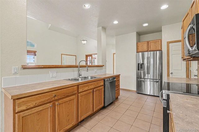 489 Longspur Drive, Brighton, CO 80601