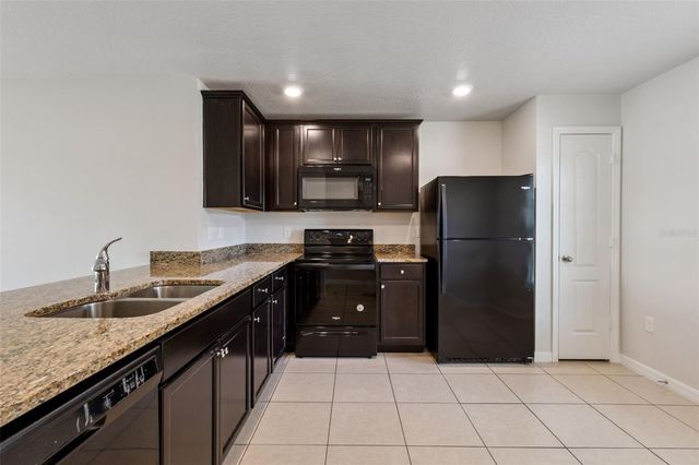1613 ORNE STREET, Mascotte, FL 34753