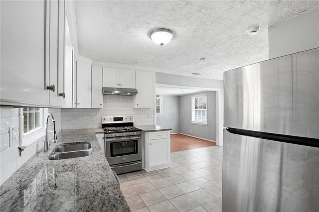 5205 5 Forks Trickum Road, Lilburn, GA 30047