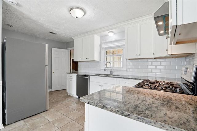 5205 5 Forks Trickum Road, Lilburn, GA 30047